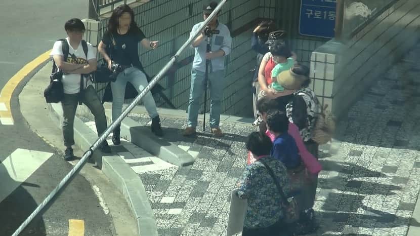 The Truth Behind the “Demonstration” of the Chinese Mother and Son