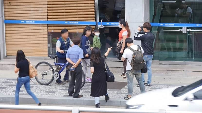 The Truth Behind the “Demonstration” of the Chinese Mother and Son1