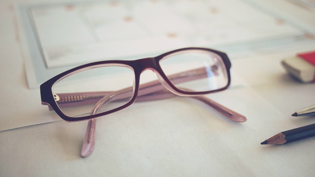a pair of glasses on the table