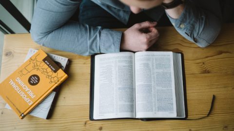 Christian reading the Bible