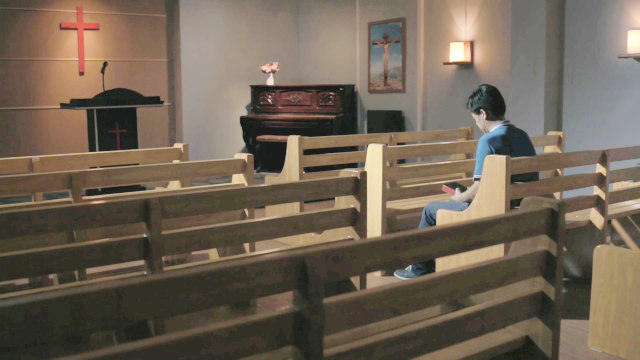 Christians praying in church